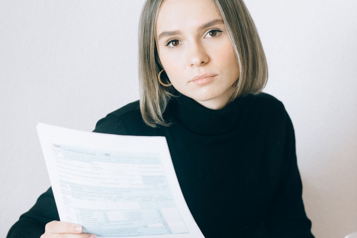 Landlord reviewing dispatch rules and finances on a laptop