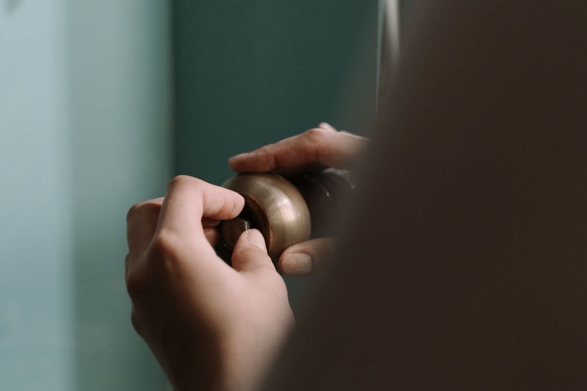 Plumber completing a repair