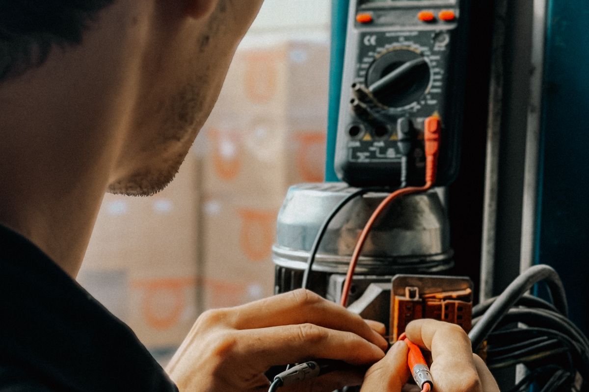 Professional electrician in uniform